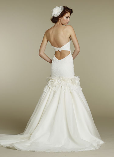 Corded embroidered lace fittoflare bridal gown with flower and lace